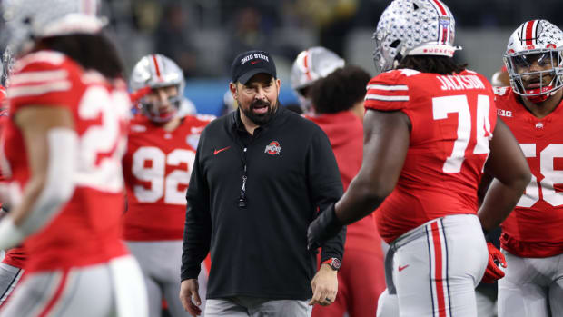 Dec 29, 2023; Arlington, TX, USA; Ohio State Buckeyes head coach Ryan Day walks on the field before the game against the Missouri Tigers at AT&T Stadium.
